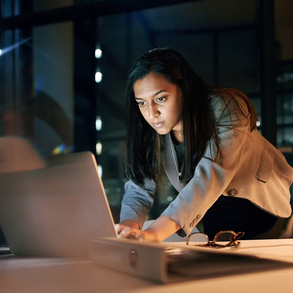 Woman working late