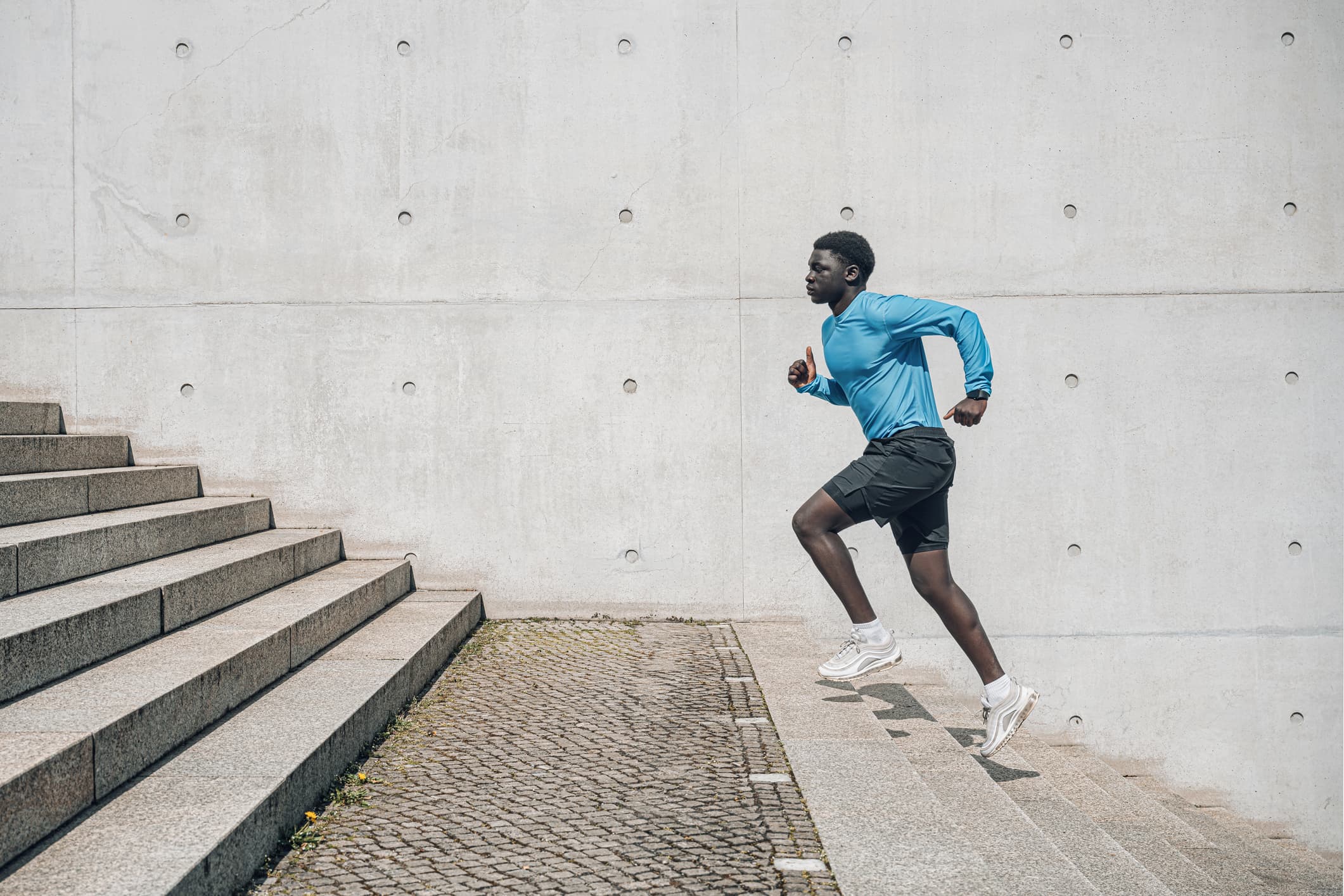 Man running up stairs