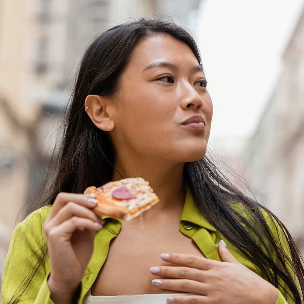 Woman eating street food